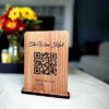 Wine-themed wooden stand with QR code