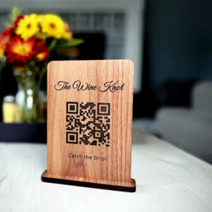 Wine-themed wooden stand with QR code