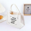 White canvas tote on lifestyle desk setting