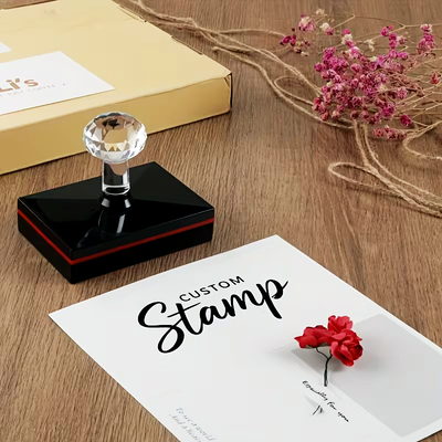 custom_merch_goods_rest_12_04_06_2026 Stamp with crystal handle on document